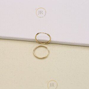 14K Yellow Gold Mini Hoop Earrings · 11 mm Round · Ultra Lightweight Delicate.